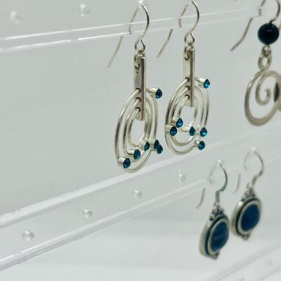 Lot 51: Modern Dangle Earrings
