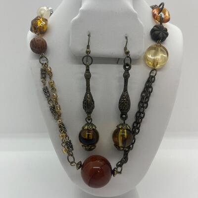 Lot 53: Earth-tone Beaded Necklace/ Earring Set & "Blingy" Beaded Multi Strand Necklace