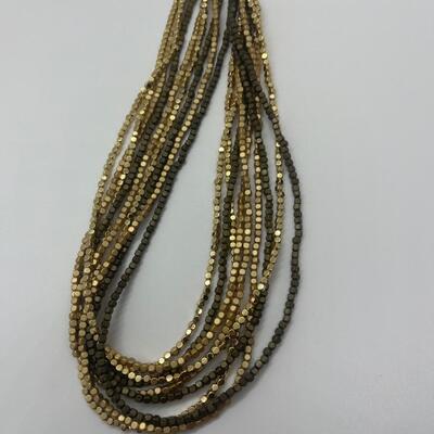 Lot 53: Earth-tone Beaded Necklace/ Earring Set & "Blingy" Beaded Multi Strand Necklace