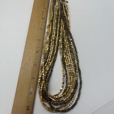 Lot 53: Earth-tone Beaded Necklace/ Earring Set & "Blingy" Beaded Multi Strand Necklace