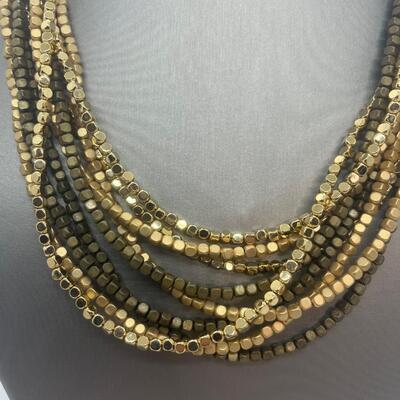 Lot 53: Earth-tone Beaded Necklace/ Earring Set & "Blingy" Beaded Multi Strand Necklace
