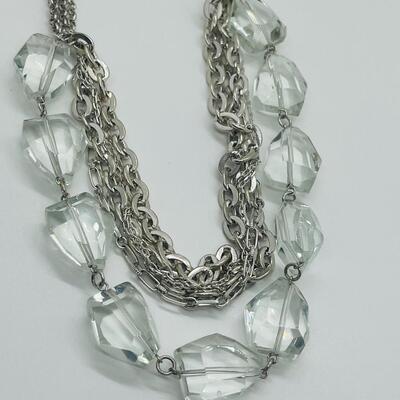 Lot 56: Multi Strand Beaded Necklace, Bracelet and Clip On Earrings