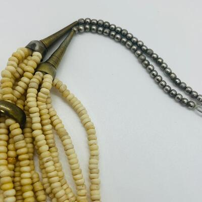 Lot 57: Vintage Multi Strand Beaded Necklace and 3 Bangle Bracelets w/Brass Accents