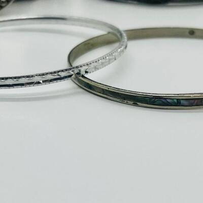 Lot 60: Silvertone Belt, Earrings and Bracelets
