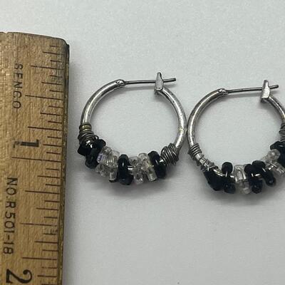 Lot 60: Silvertone Belt, Earrings and Bracelets