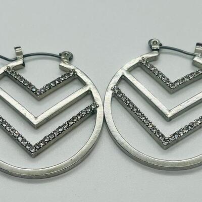 Lot 60: Silvertone Belt, Earrings and Bracelets