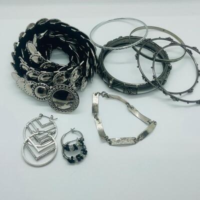 Lot 60: Silvertone Belt, Earrings and Bracelets