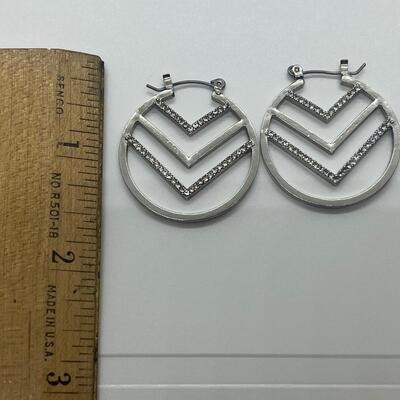 Lot 60: Silvertone Belt, Earrings and Bracelets