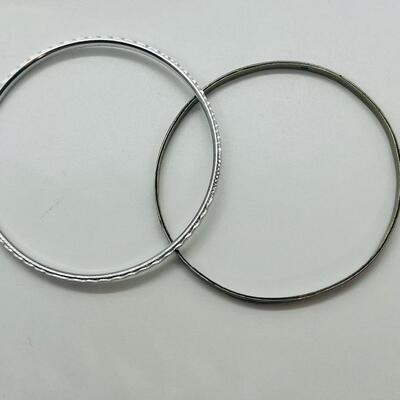 Lot 60: Silvertone Belt, Earrings and Bracelets