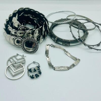 Lot 60: Silvertone Belt, Earrings and Bracelets