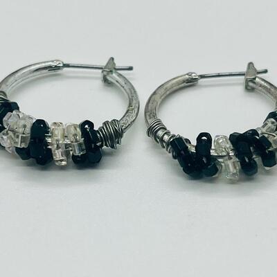 Lot 60: Silvertone Belt, Earrings and Bracelets