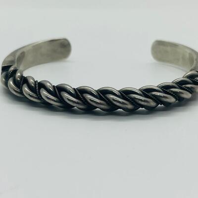 Lot 66: Vintage Chunky Sterling Silver Cuff Bracelet with Embellished Design.