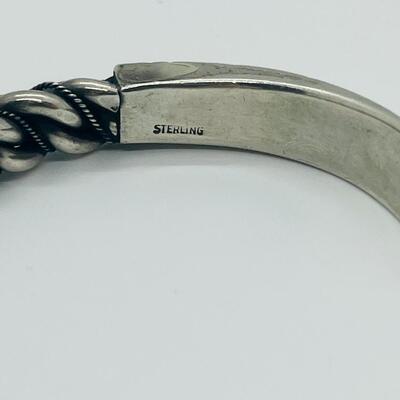 Lot 66: Vintage Chunky Sterling Silver Cuff Bracelet with Embellished Design.