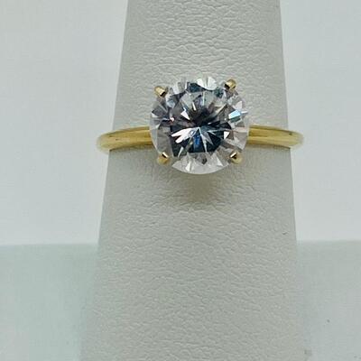 Lot 77: 14k Yellow Gold Solitaire Cubic Zirconia Ring
