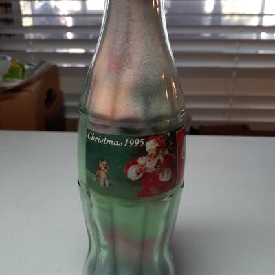 1 christmas coke classic bottle with colorerd sand