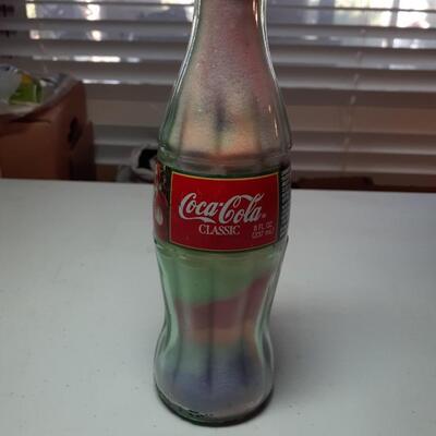1 christmas coke classic bottle with colorerd sand
