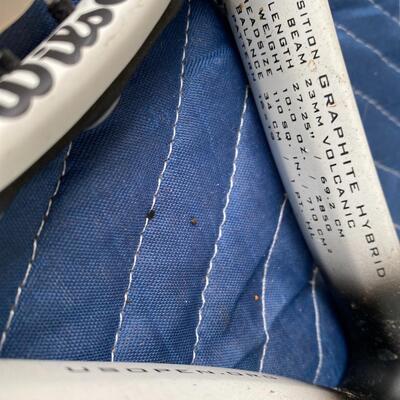 Two Tennis Rackets and Walking Sticks