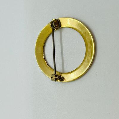 Lot 99: Four Brooches / Pin lot