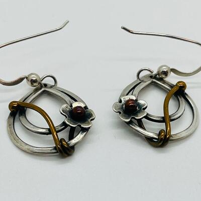 Lot 102: Sterling and copper Brooch, pendant and pierced earrings