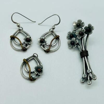 Lot 102: Sterling and copper Brooch, pendant and pierced earrings