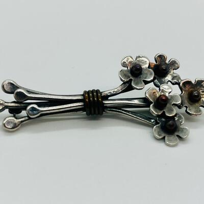 Lot 102: Sterling and copper Brooch, pendant and pierced earrings