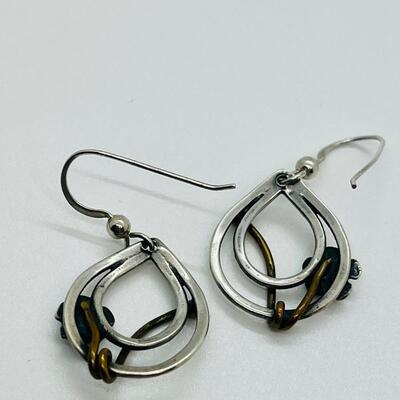 Lot 102: Sterling and copper Brooch, pendant and pierced earrings