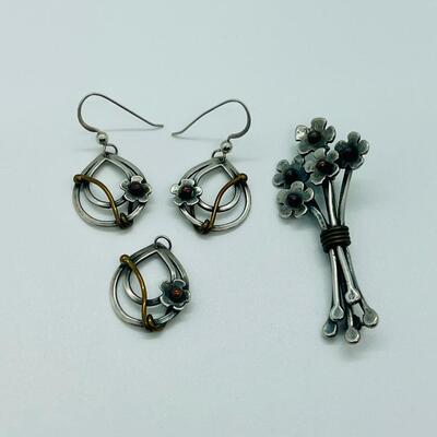 Lot 102: Sterling and copper Brooch, pendant and pierced earrings