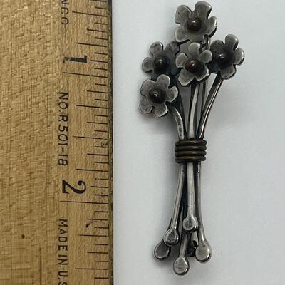 Lot 102: Sterling and copper Brooch, pendant and pierced earrings