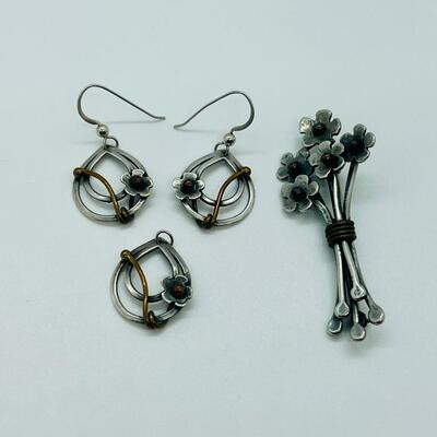 Lot 102: Sterling and copper Brooch, pendant and pierced earrings