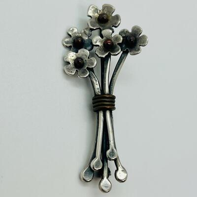 Lot 102: Sterling and copper Brooch, pendant and pierced earrings