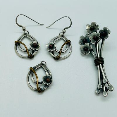 Lot 102: Sterling and copper Brooch, pendant and pierced earrings