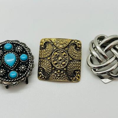 Lot 107: Clip lot:  Two Scarf Clips & Southwestern Sterling & Turquoise Collar/Bolo/Sash clip
