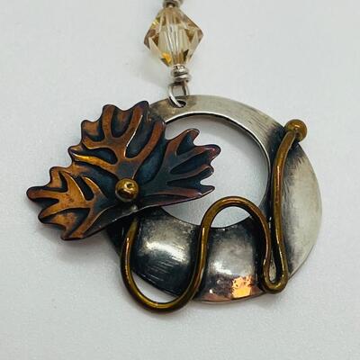 Lot 109: Gardella Sterling Tri Color Silver, Copper Brass Earrings & Pendant Set