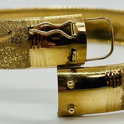 Lot 111: 10k Marked B&M Yellow Gold Latching Bangle Bracelet