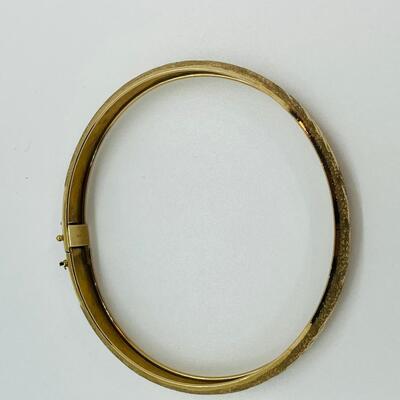 Lot 111: 10k Marked B&M Yellow Gold Latching Bangle Bracelet