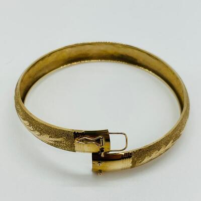 Lot 111: 10k Marked B&M Yellow Gold Latching Bangle Bracelet