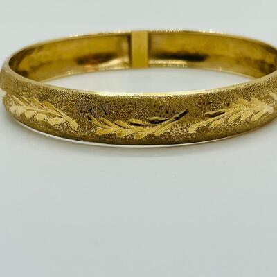 Lot 111: 10k Marked B&M Yellow Gold Latching Bangle Bracelet