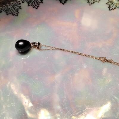 7.5 MM Tahitian pearl on 18k bale with 20