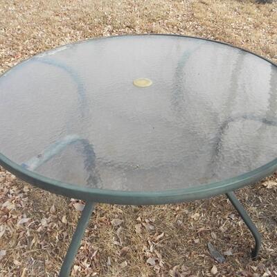 LOT 199  OUTDOOR TABLE AND CHAIRS