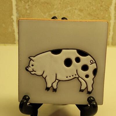 Lot 32: Red Pig Pitcher and Family Tiles Pig Tile
