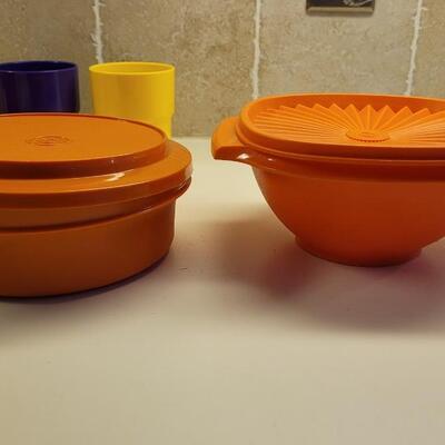 Lot 37: (2) Vintage Orange Tupperware Bowls with Lids & (3) Plastic Coffee Mugs & (2) Plastic Cups