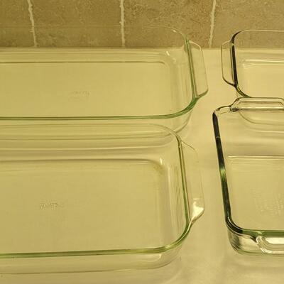 Lot 55: (4) Clear Pyrex Casserole Dishes