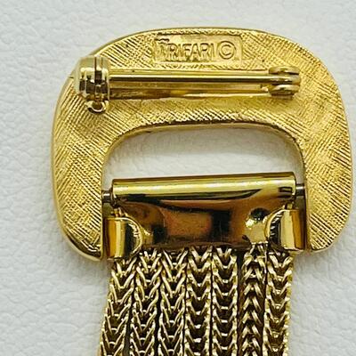 Lot 114: Vintage Goldtone Crown Trifari Chain Tassel Brooch