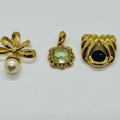 Lot 115: Three Nolan Miller Pendants