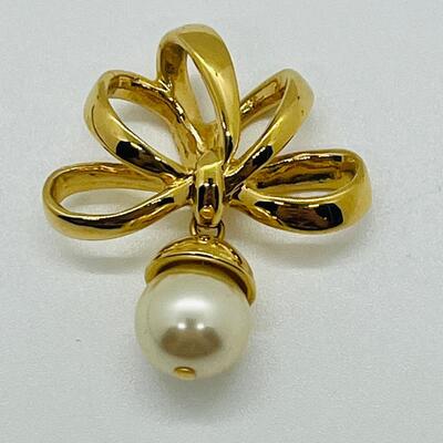 Lot 115: Three Nolan Miller Pendants