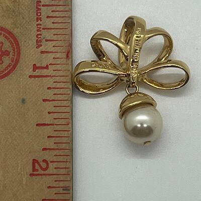 Lot 115: Three Nolan Miller Pendants