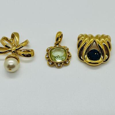Lot 115: Three Nolan Miller Pendants