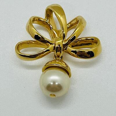 Lot 115: Three Nolan Miller Pendants