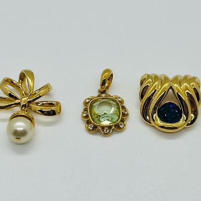 Lot 115: Three Nolan Miller Pendants