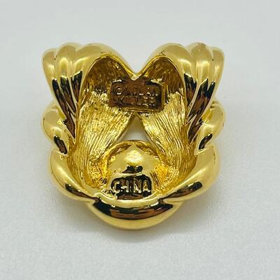 Lot 115: Three Nolan Miller Pendants